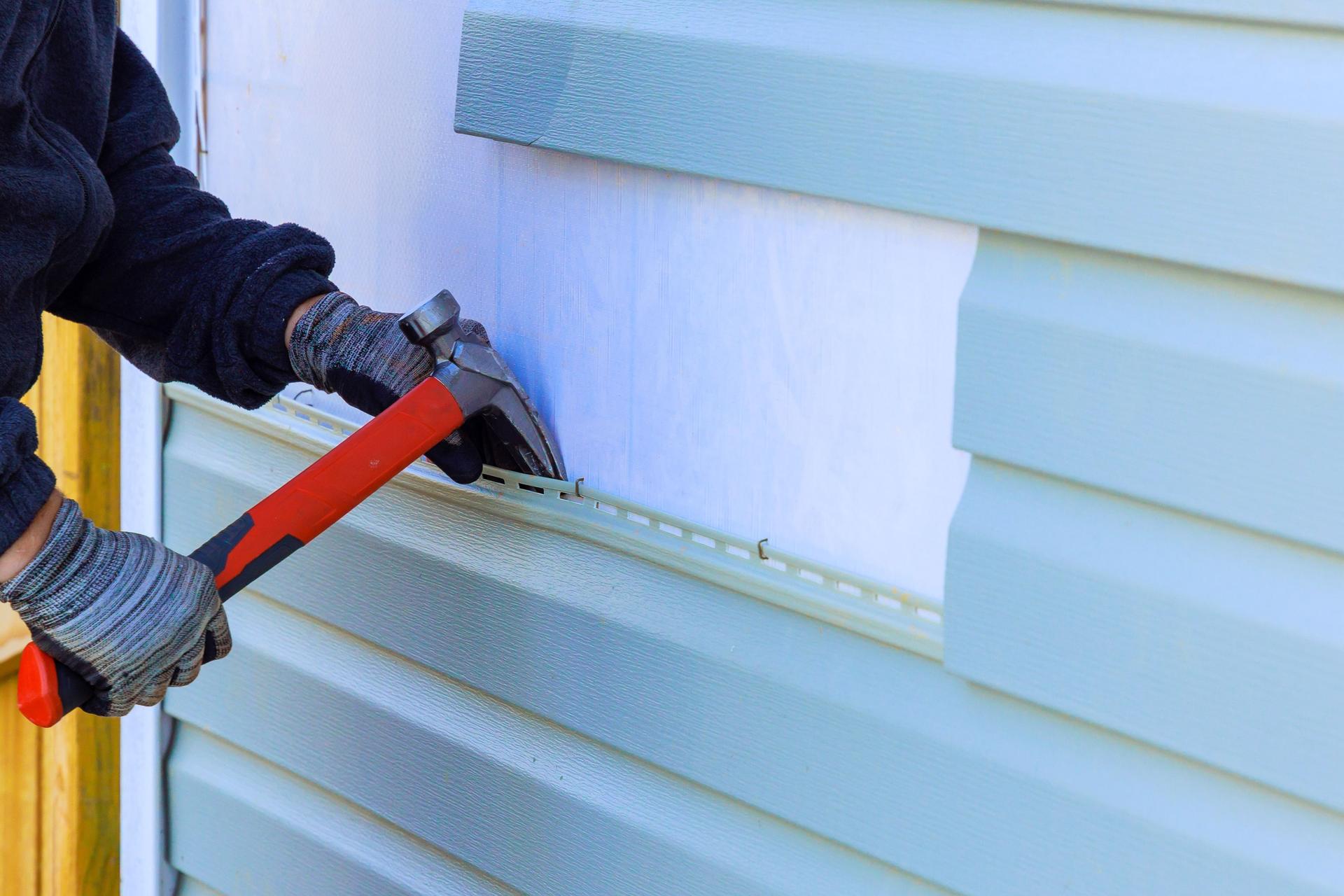 An exterior wall of a house was covered in plastic siding that needed to be replaced